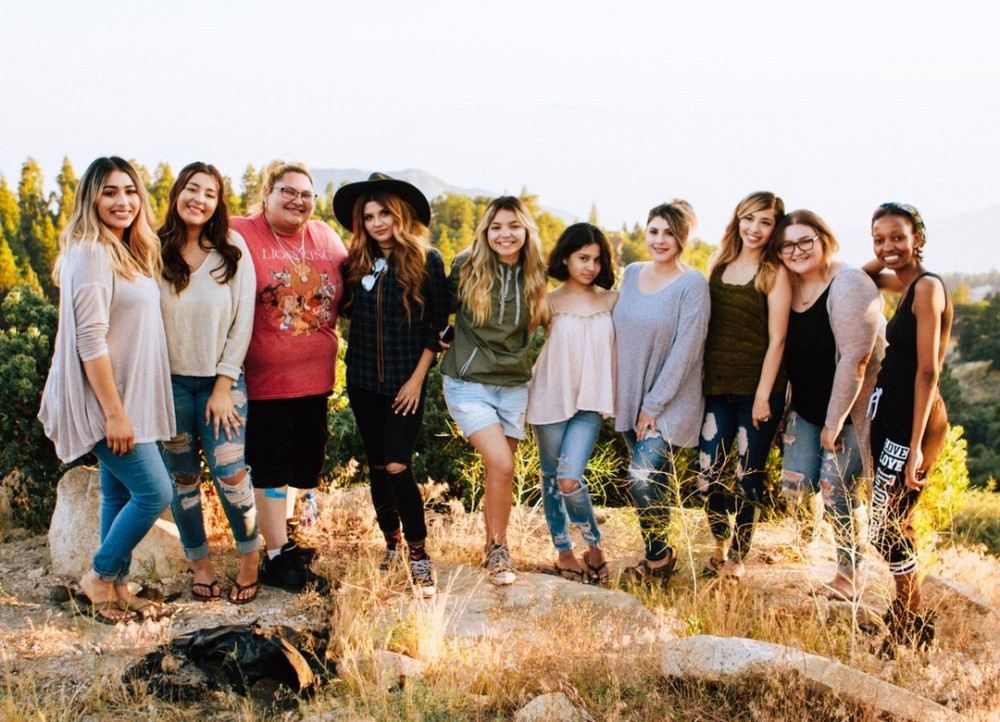 group of girls being photographed