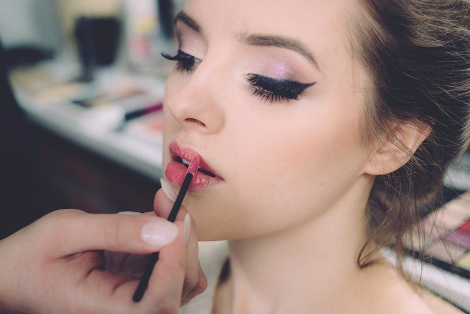 Money Saving Wedding Tips - Woman Having Lipstick Put On
