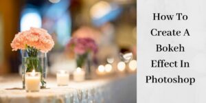 peach flower in vase with votive candles