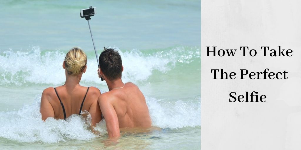 How To Take A Perfect Selfie - Couple in Ocean Taking selfie 