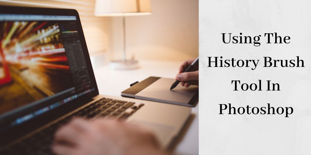 person using the history brush tool in photoshop